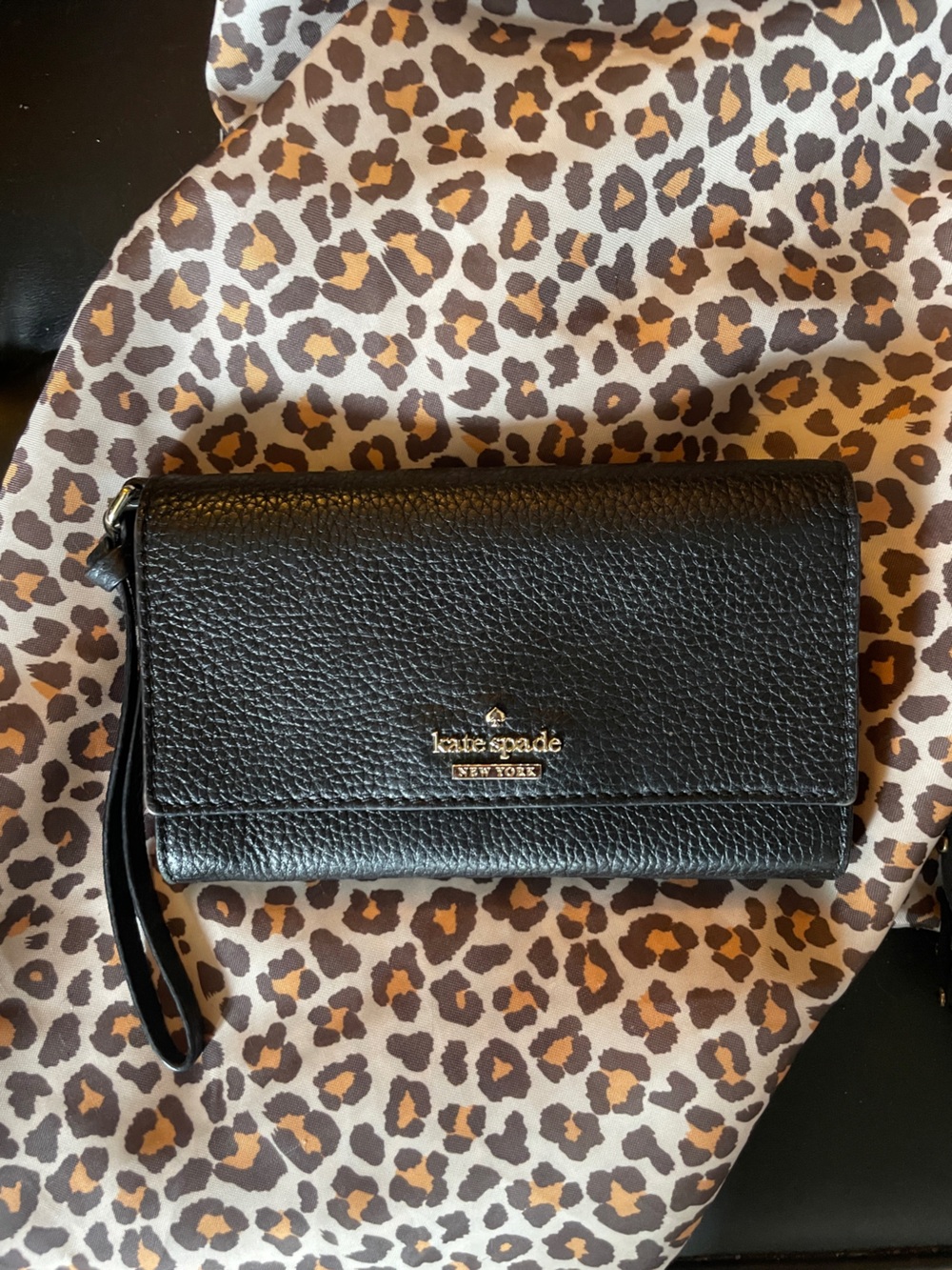 kate spade Black Pebbled Leather Wristlet Phone Case with Gold Logo